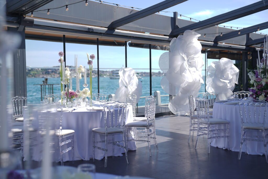 Bosphorus-view wedding venue in Istanbul set with white chairs